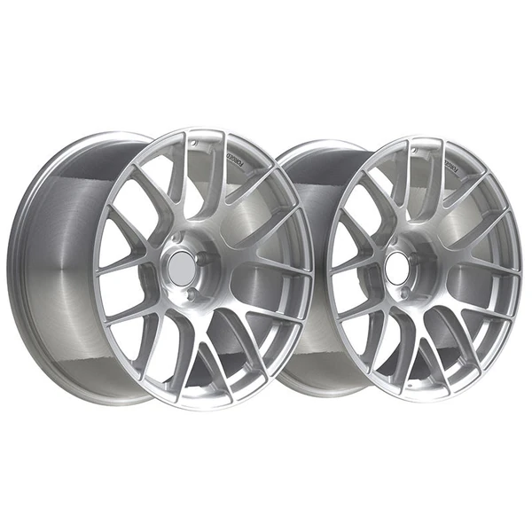 Silver Broad-Curve Ten-Spoke Forged Wheel — Pair of silver broad-curve faces at an oblique angle