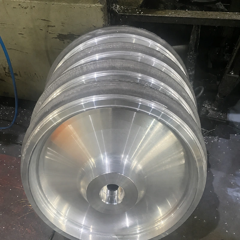 Stacked machined wheel blanks in a representative workshop stage