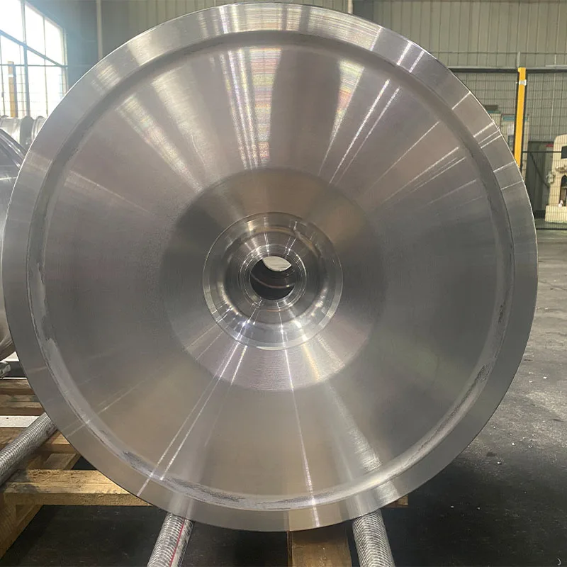 Single unfinished aluminum wheel blank in a representative workshop stage