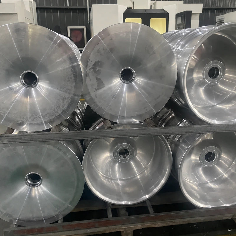 Machined aluminum wheel blanks in a representative workshop stage