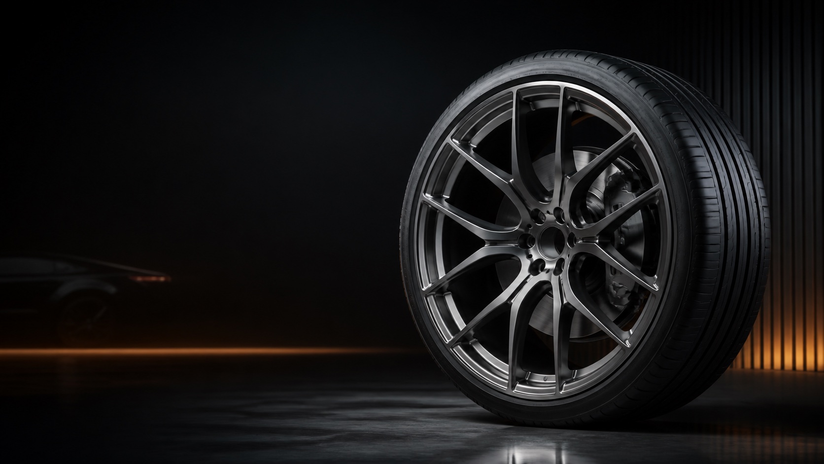 Premium forged alloy wheel in a dark automotive studio